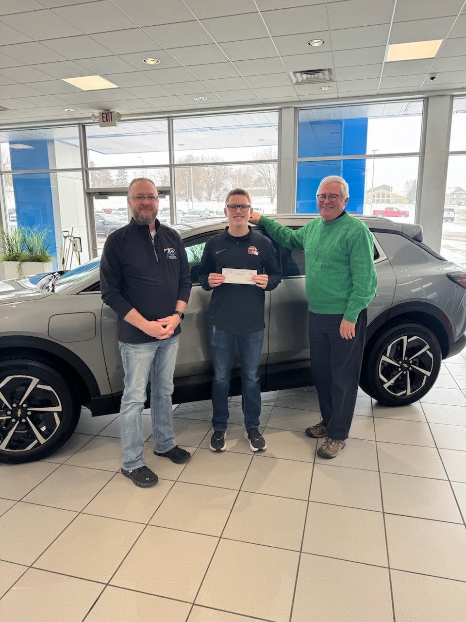Kemna GMC check presentation in Algona, Iowa supporting a local community organization