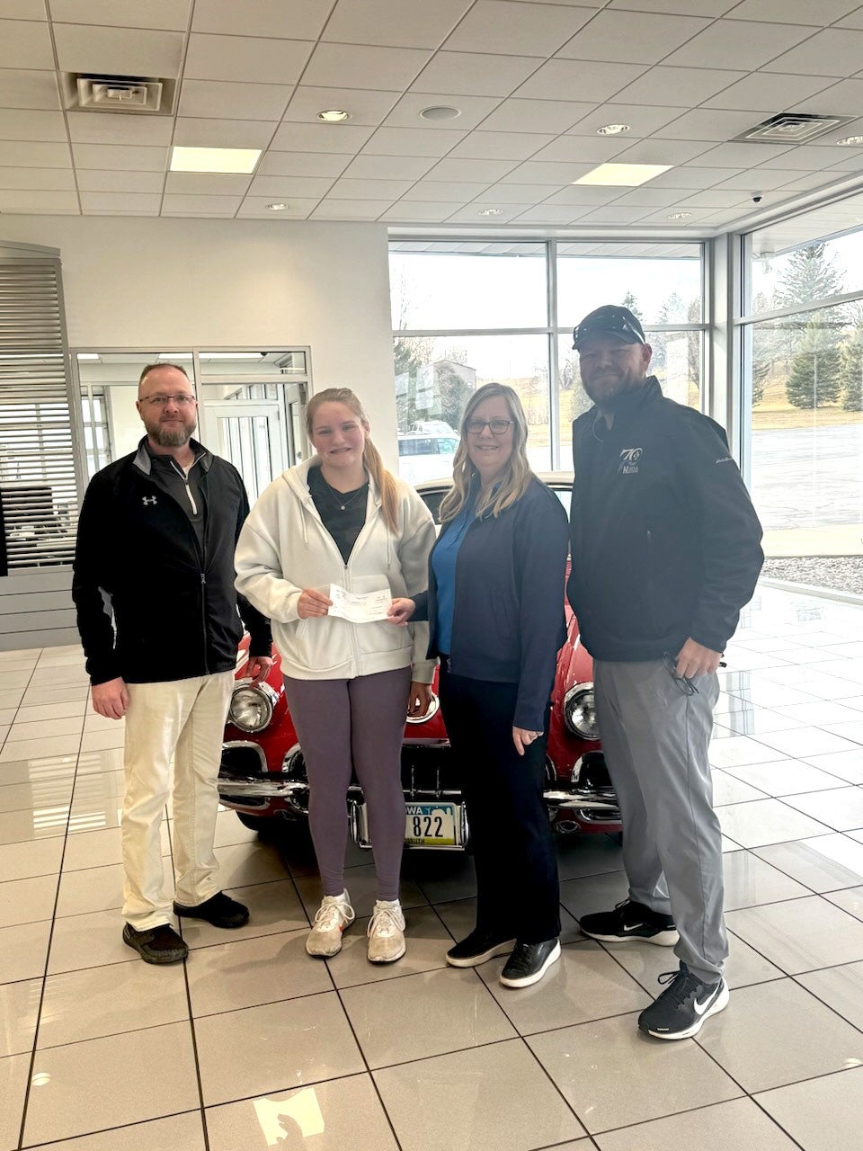 Kemna GMC team presenting another donation to first responders and local heroes in Algona, Iowa