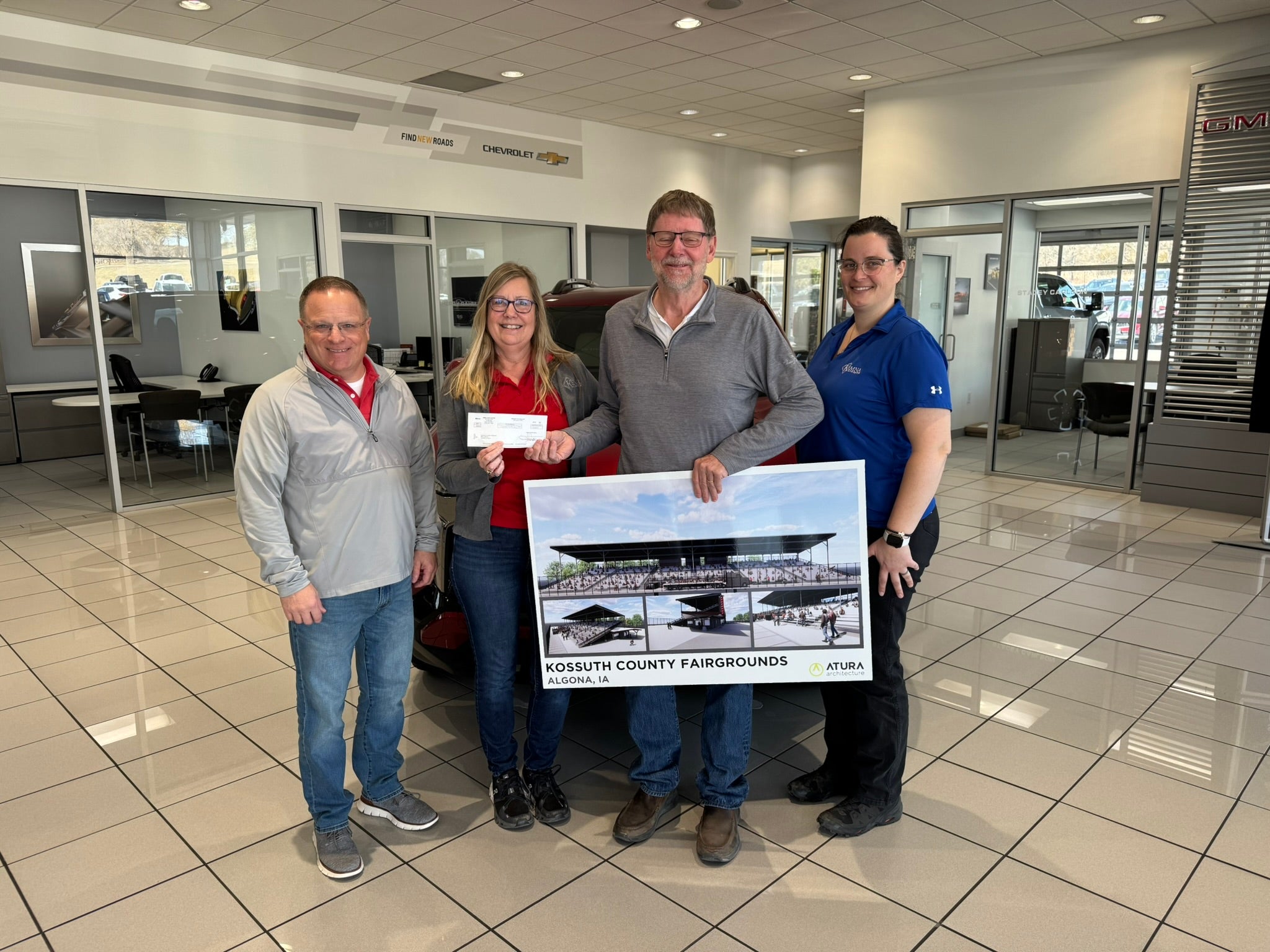 Kemna GMC donating to the Kossuth County Raceway in Algona, Iowa