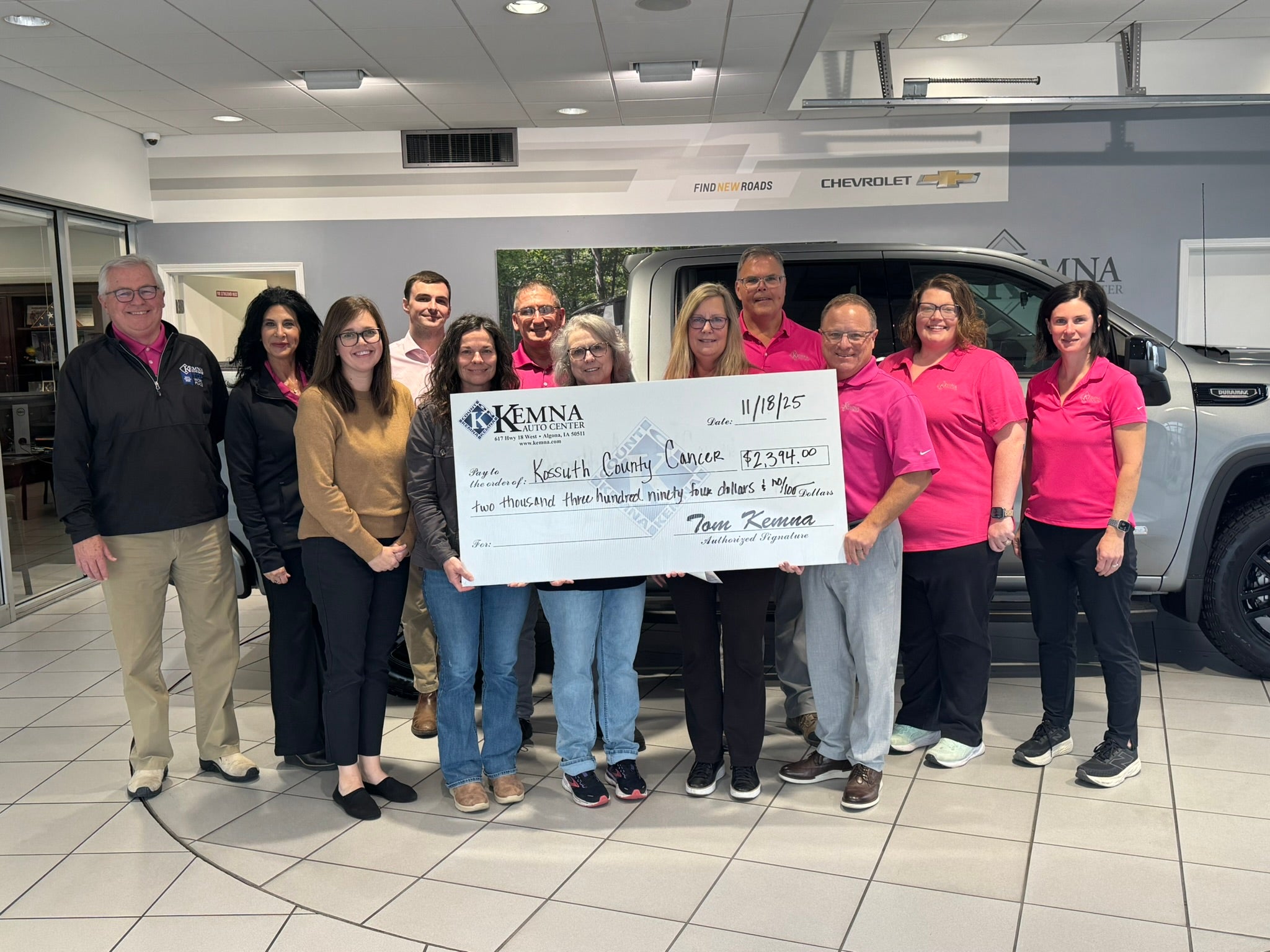 Kemna GMC presenting a donation check to the Kossuth County Cancer Research Foundation in Algona, Iowa